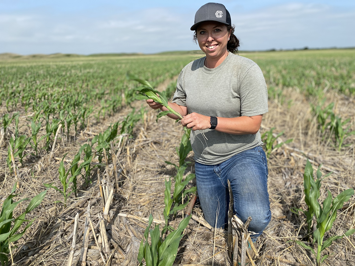 Agronomist Kneeling