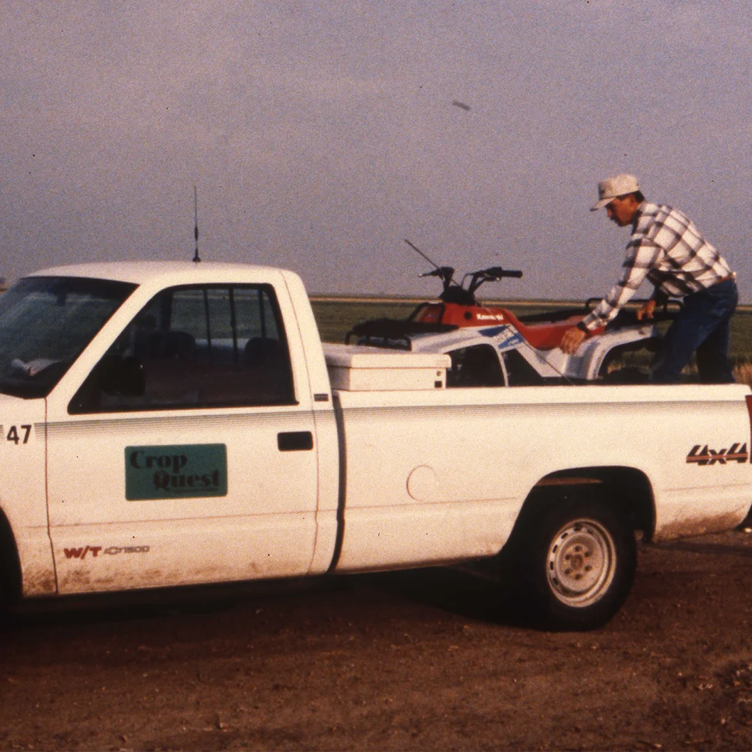 Agronomist loading atv in truck agronomist loading atv in truck